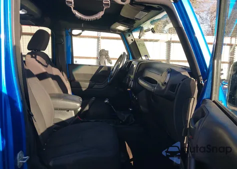 2015 Jeep Wrangler Unlimited Willys Wheeler from USA, damaged, VIN 1C4BJWDG9FL511861